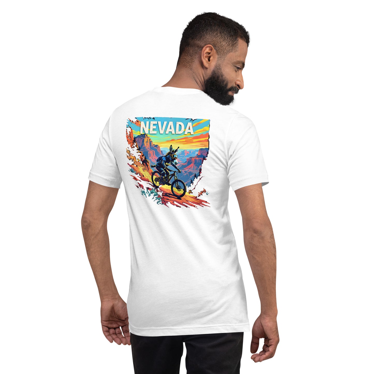 Man wearing a white t-shirt with a colorful 'NEVADA' graphic on the back.