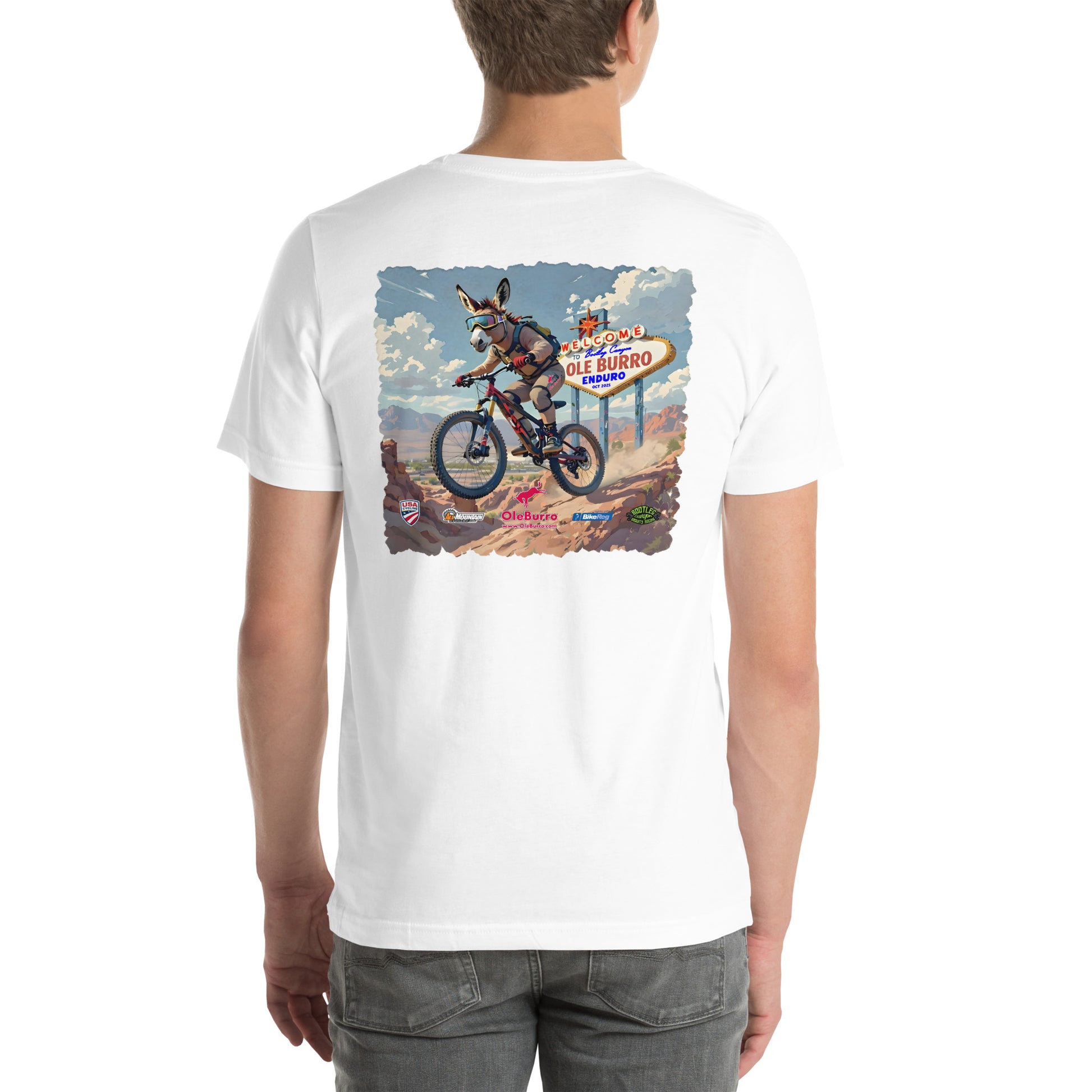White t-shirt with a graphic of a donkey riding a bike and a sign on the back, worn by a person.